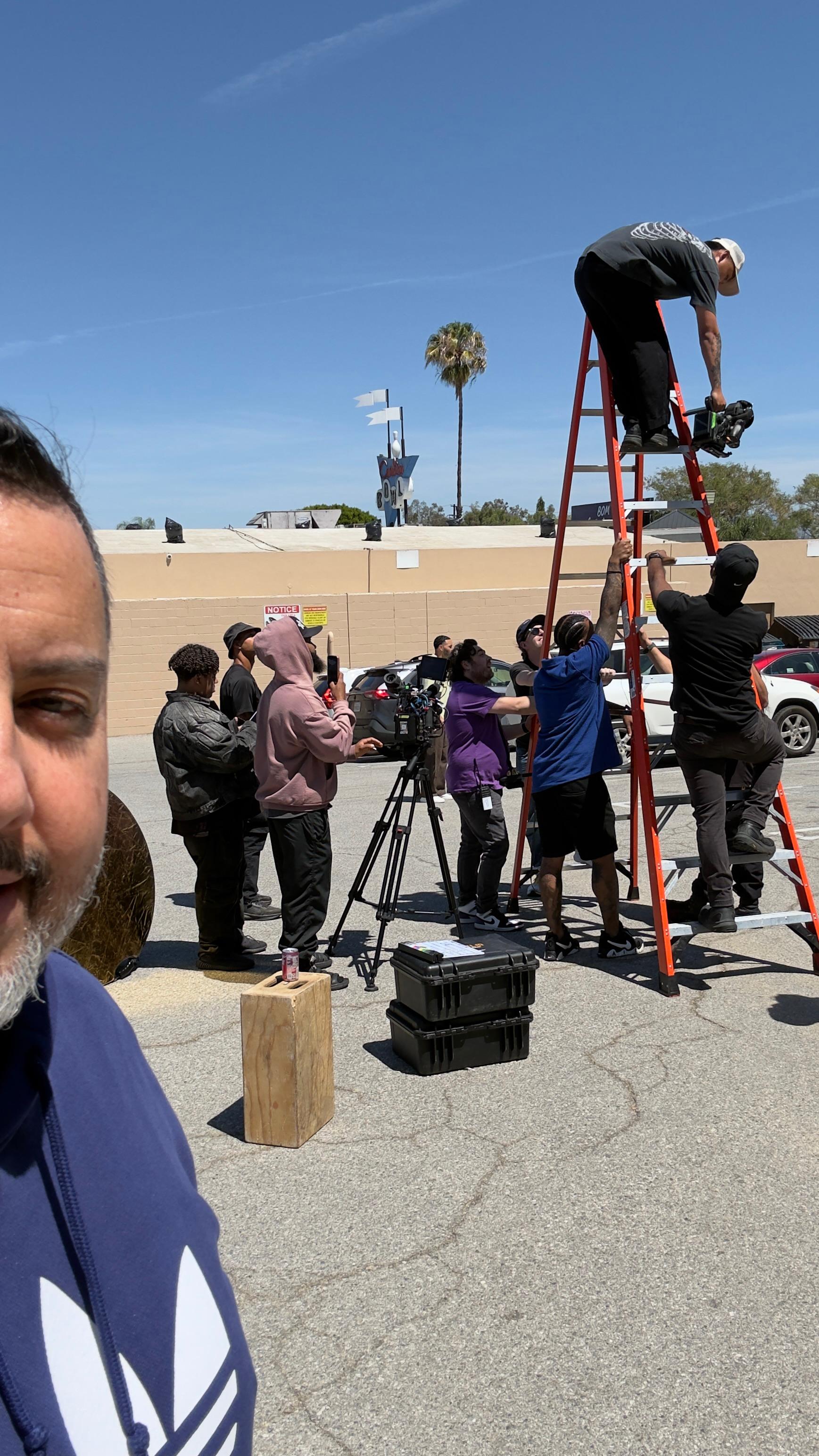 Large film crew working on outdoor shoot - Professional filmmaking Los Angeles